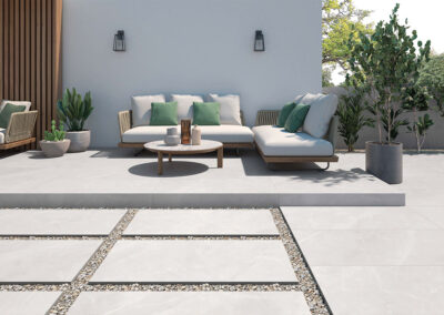 light grey outdoor tiles used in outdoor seating area and paving from design di lusso watford outdoor tile store