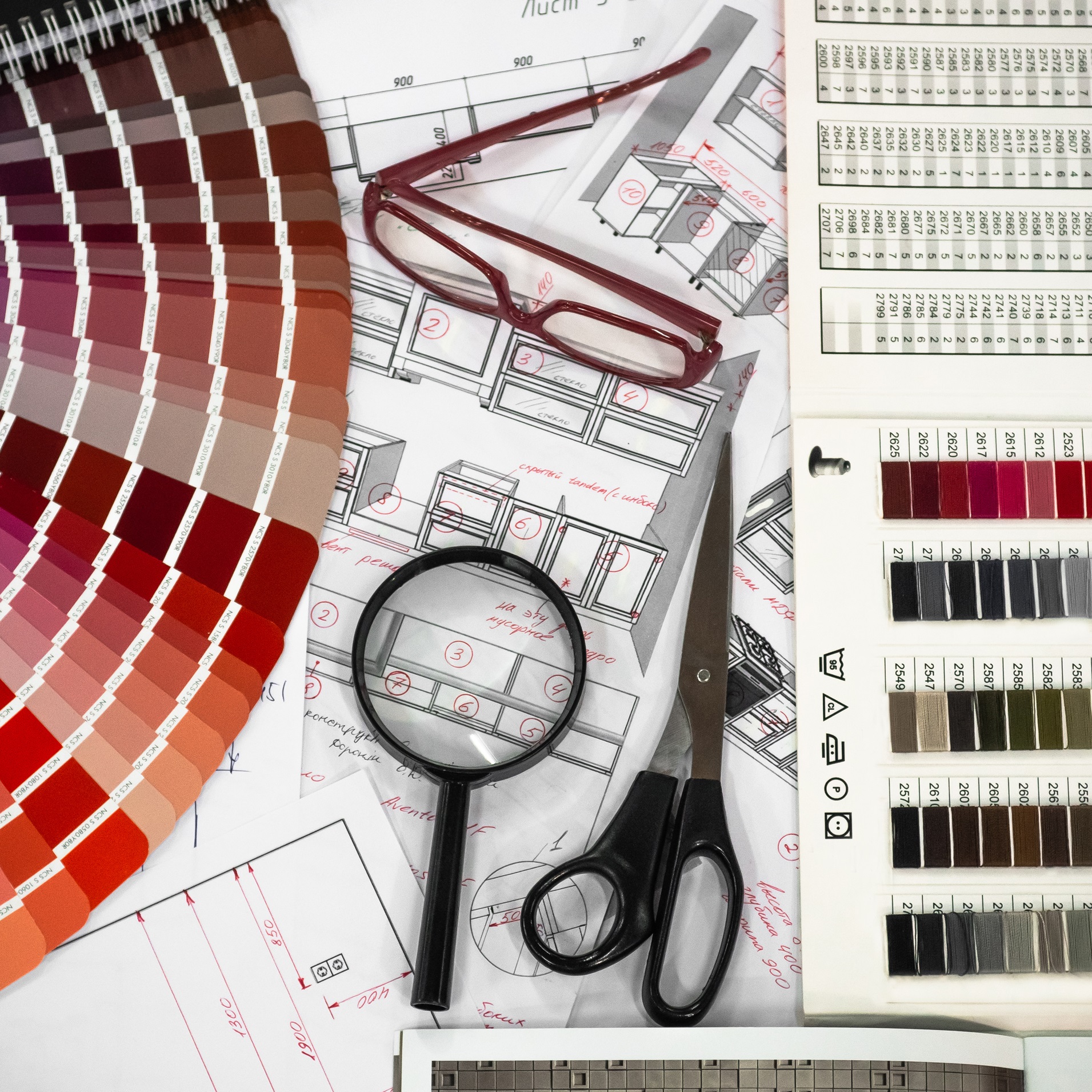 Architectural blueprint interior with wooden samples and multi-colored palette and draw tools. Industry Production Concepts